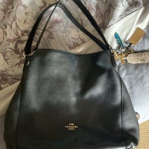Coach, Edie style, black pebble, leather with keychain, feather accessory